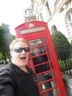 photo of two men and a phone booth